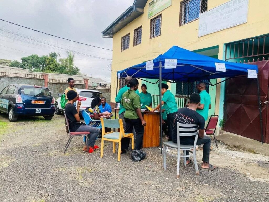 ASCOA volunteers at a community health screening stand