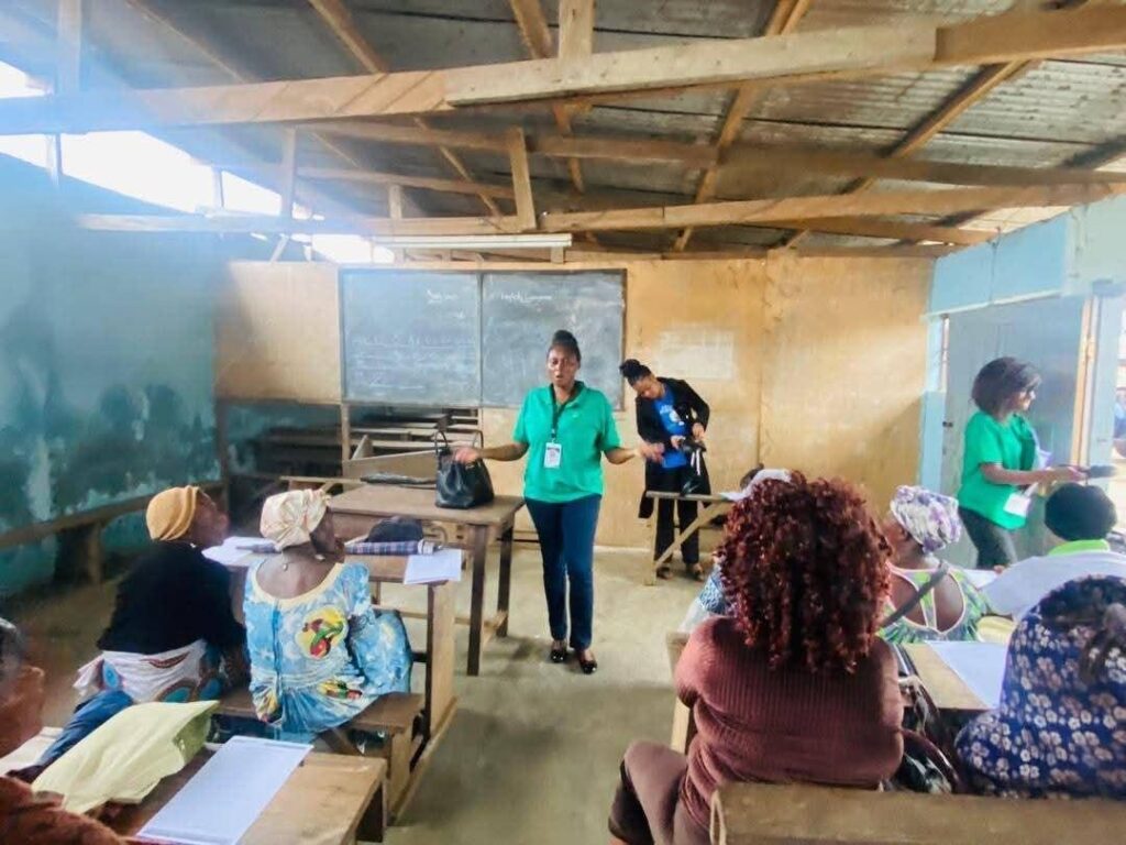 Facilitators leading entrepreneurship training for mothers