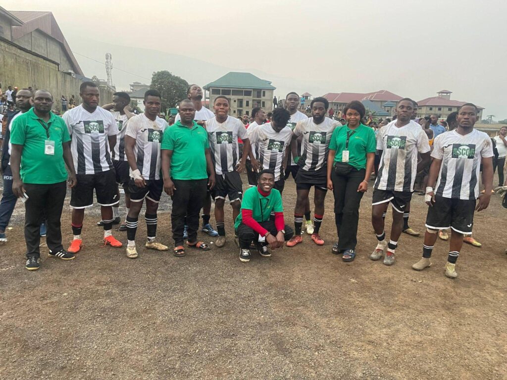 Football players gathered for an ASCOA peace event