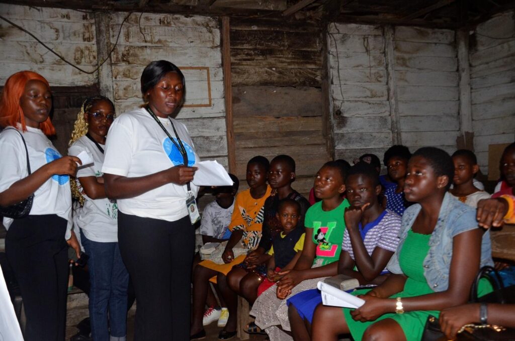ASCOA facilitators discussing menstrual health with participants